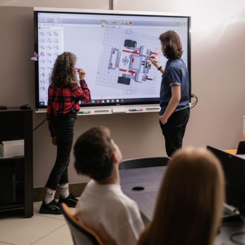 Students Making a Report Inside the Classroom
